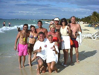 Ted and Amy and Friends on the beach in Negril Jamaica