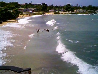 Children playing on the Yacht Club Beach in Negril, Jamaica