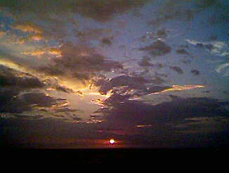 Sunset at Drumville Cove on the cliffs in Negril, Jamaica